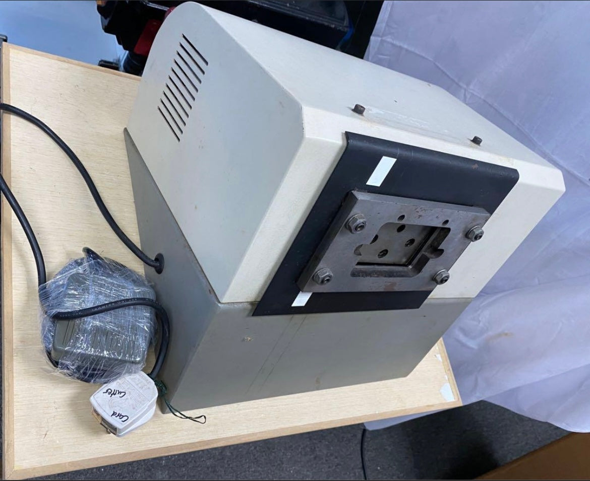 Carousel Sale: Plastic ID Card Puncher, Auto with Leg Paddle